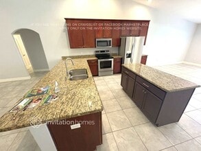 23283 Mulligan Ave in Port Charlotte, FL - Building Photo - Building Photo
