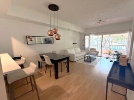 1018 Woodshire Ln, Unit A202 in Naples, FL - Building Photo