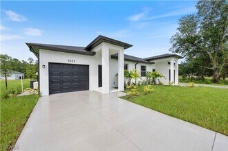 1025 Meadow Rd in Lehigh Acres, FL - Building Photo - Building Photo