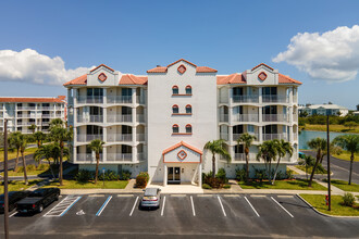 Puerto Del Rio Condominiums in Cape Canaveral, FL - Building Photo - Building Photo