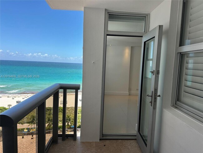 property at 6039 Collins Ave