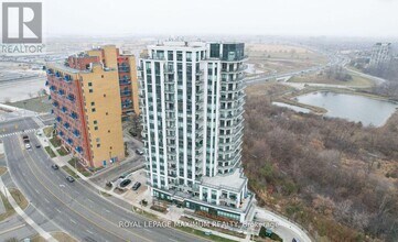 840-1840 Queens Plate Dr in Toronto, ON - Building Photo - Building Photo