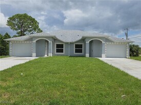 397 Carrillon Ave S in Lehigh Acres, FL - Building Photo
