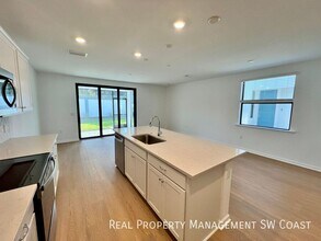 27851 Solis Grande Dr in Bonita Springs, FL - Building Photo - Building Photo