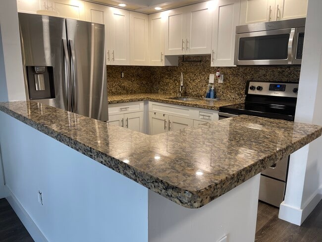 19055 NW 62nd Ave, Unit 104 countryside village