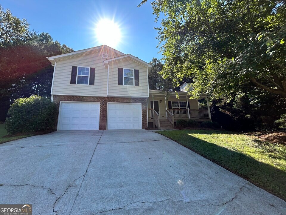 1313 Jered Ct NE in Sugar Hill, GA - Building Photo
