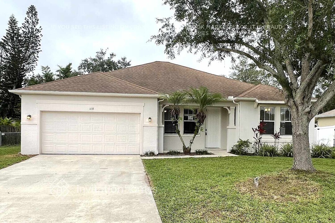 1133 SW Ivanhoe St in Port St. Lucie, FL - Building Photo