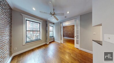 Elizabeth Street, Unit 5B in New York, NY - Building Photo - Building Photo