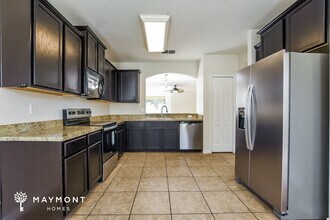 12913 Regiment Dr, Unit D141 in Grand Island, FL - Building Photo - Building Photo