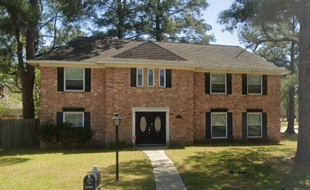 8123 Theisswood Rd in Spring, TX - Building Photo