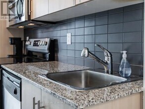 65-1265 Bremner Blvd in Toronto, ON - Building Photo - Building Photo
