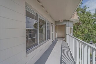 2441 Persian Dr, Unit 61 in Clearwater, FL - Foto de edificio - Building Photo