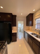 1159 N Wilton Pl, Unit Apt 1503 in Los Angeles, CA - Building Photo - Building Photo