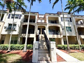5840 W Sample Rd, Unit #303 in Coral Springs, FL - Building Photo