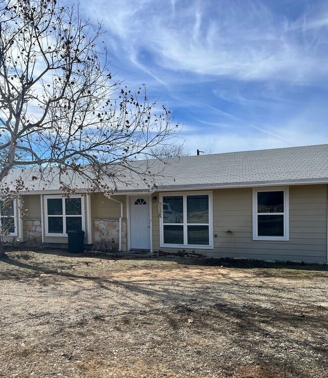property at 718 FM474