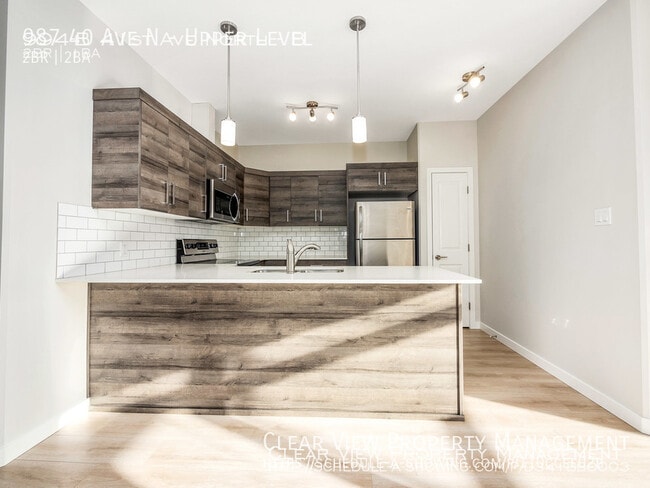 property at 987-940 40 Ave N