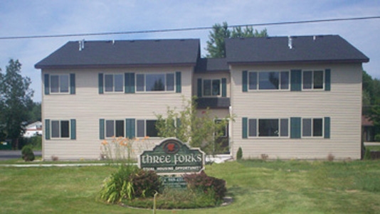 Three Forks Apartments in Beaverton, MI - Building Photo