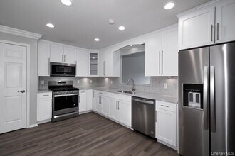 128 Village Green Dr in Port Jefferson Station, NY - Building Photo - Building Photo