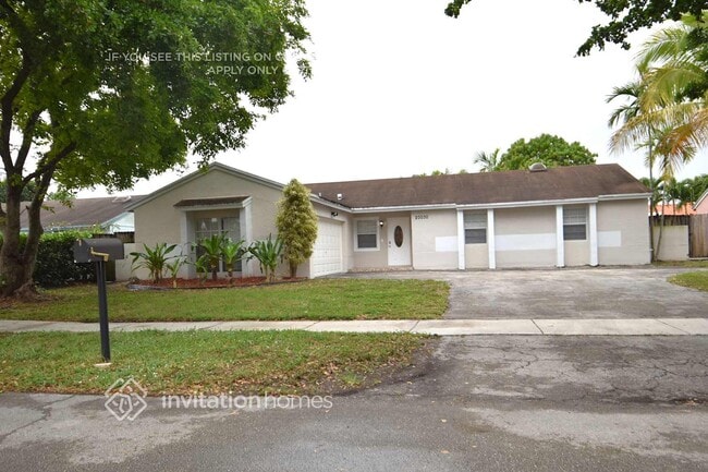 property at 20030 NW 58th Ave