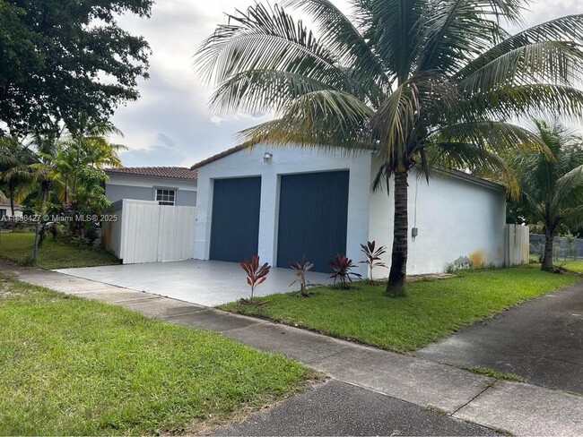 property at 205 NW 130th St