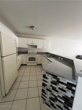 1108 Ivan Ave S in Lehigh Acres, FL - Foto de edificio - Building Photo