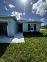 1802 SW Davis St in Port St. Lucie, FL - Building Photo - Building Photo