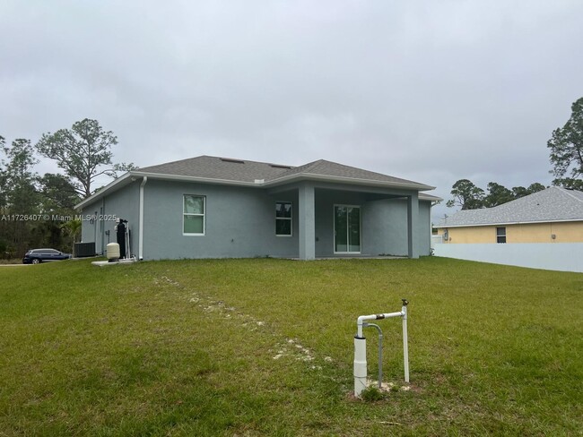 712 Wellington Ave in Lehigh Acres, FL - Building Photo - Building Photo