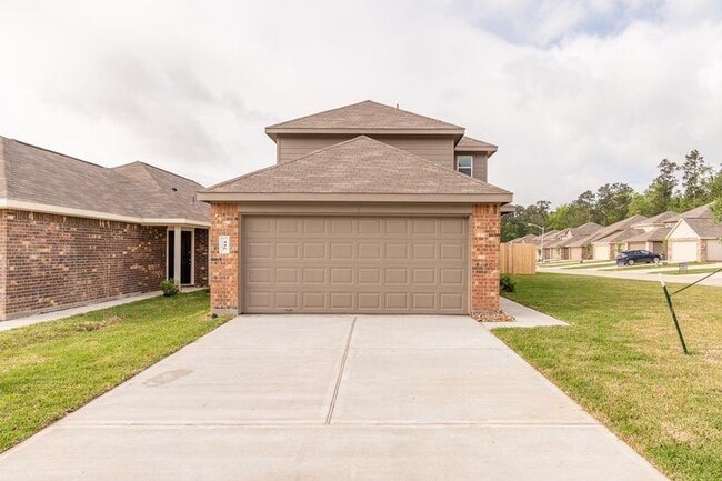445 Upper Creek Dr in Willis, TX - Building Photo - Building Photo