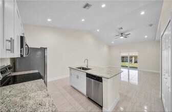 2118 Zaharihas Dr in Lehigh Acres, FL - Building Photo - Building Photo