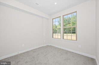 19822 Habitat Ter in Montgomery Village, MD - Foto de edificio - Building Photo