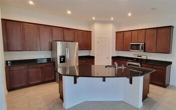 12706 Westside Vlg Lp in Windermere, FL - Building Photo - Building Photo