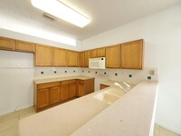 3704 Woodfield Ct in Coconut Creek, FL - Building Photo - Building Photo