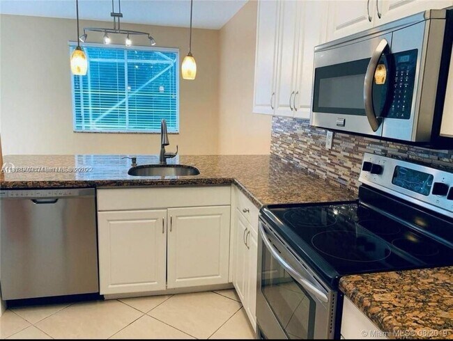 5115 Stage Coach Dr in Coconut Creek, FL - Building Photo - Building Photo