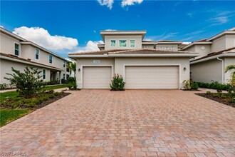 3760 Pebblebrook Ridge Ct-Unit -101 in Ft. Myers, FL - Foto de edificio - Building Photo