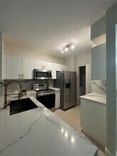 8000 N Nob Hill Rd in Tamarac, FL - Building Photo - Building Photo