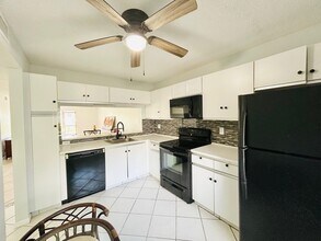 7590 Tahiti Ln in Greenacres, FL - Building Photo - Building Photo