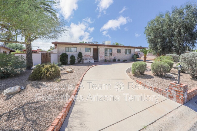 property at 7022 E 3rd St