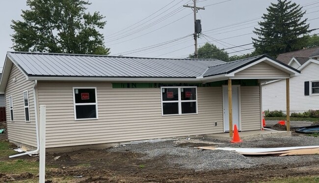 property at 212 E 1st St