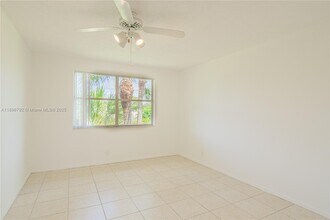 9033 Wiles Rd in Coral Springs, FL - Building Photo - Building Photo