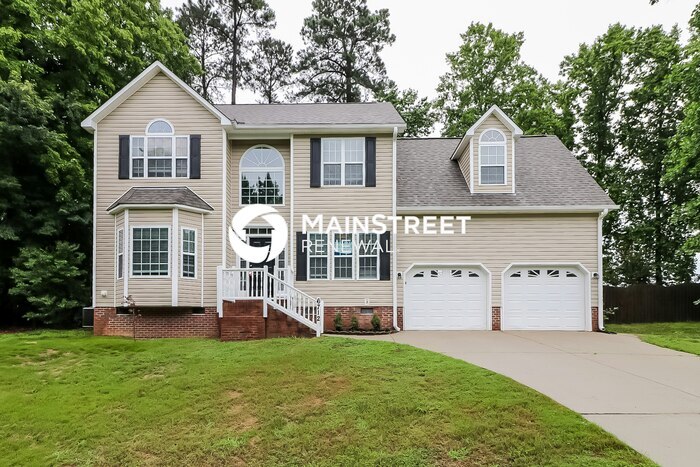 6712 Country Hollows Ln in Holly Springs, NC - Building Photo