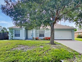 6451 NW Halibut St in Port St. Lucie, FL - Building Photo