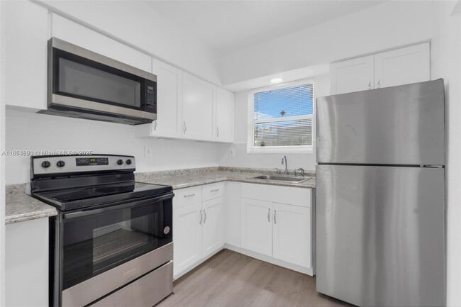 property at 3051 NW 77th St