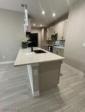 7324 Rockefeller Dr in Naples, FL - Building Photo - Building Photo