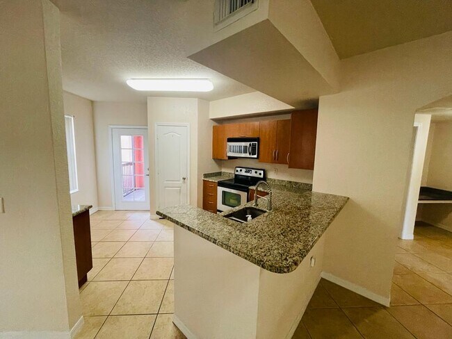 property at 138 NW Peacock Blvd