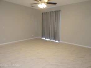 1038 Locust Ave NW in Palm Bay, FL - Building Photo - Building Photo