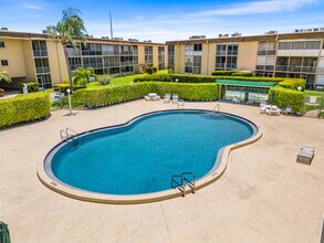 500 Village Green Cir E in Palm Springs, FL - Building Photo - Building Photo