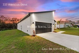 337 Hibiscus Dr in Poinciana, FL - Foto de edificio - Building Photo