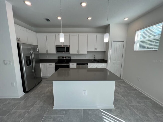 7492 Stone Crk Trl in Kissimmee, FL - Building Photo - Building Photo