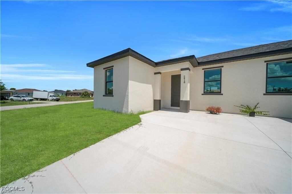 2416-2418 Xelda Ave N in Lehigh Acres, FL - Building Photo