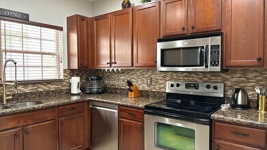 4702 Cohune Palm Ct in Greenacres, FL - Building Photo - Building Photo